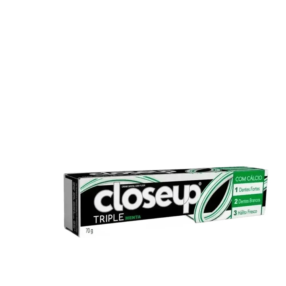 Creme dental com fluor triple menta americana closeup 70g